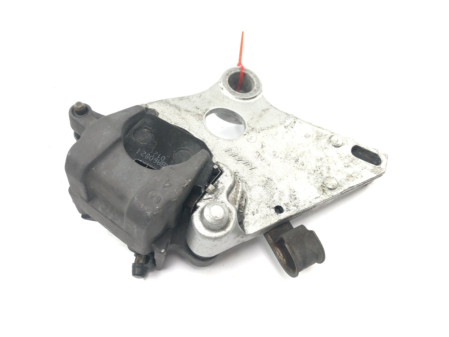 Honda CBR 900 RR SC28 [1995] - Rear brake caliper with brake anchor plate Rear brake caliper brake caliper with holder